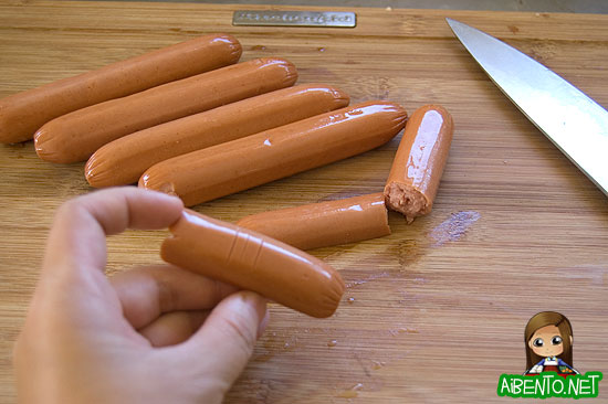 Cutting the hot dogs